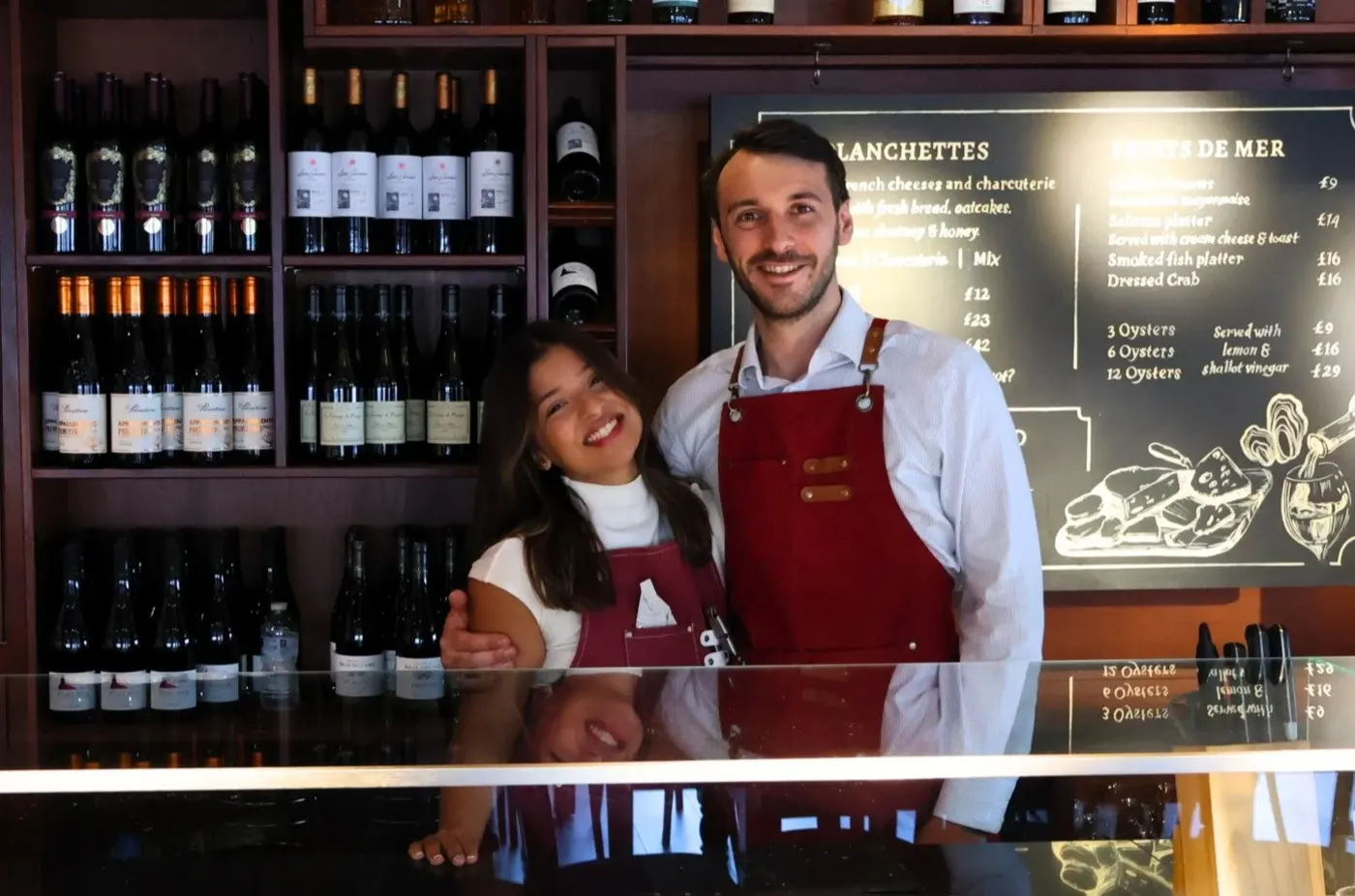 Jonathan and Isla behind the counter at Chez Bernard